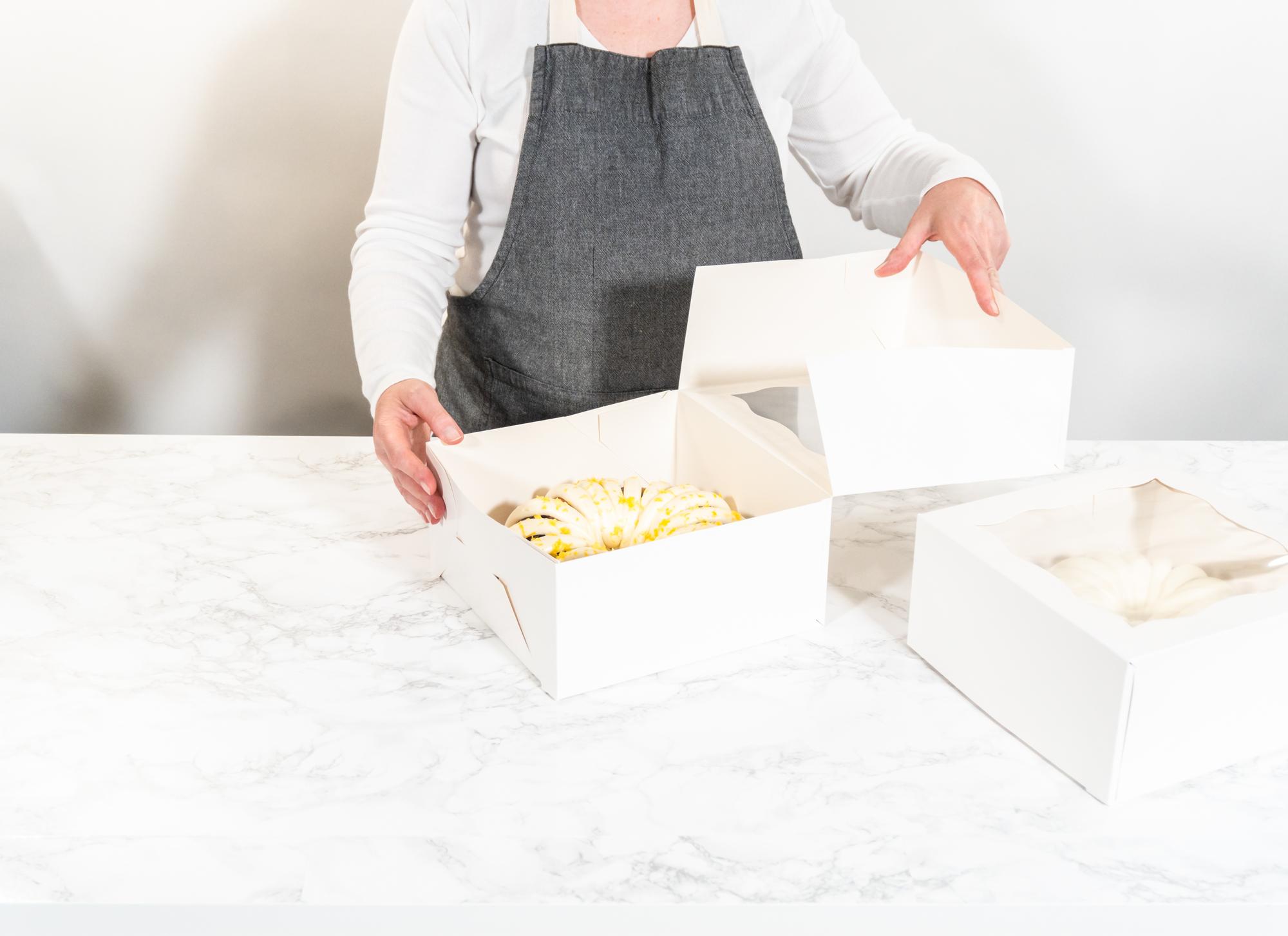 Chef preparing meal kit boxes